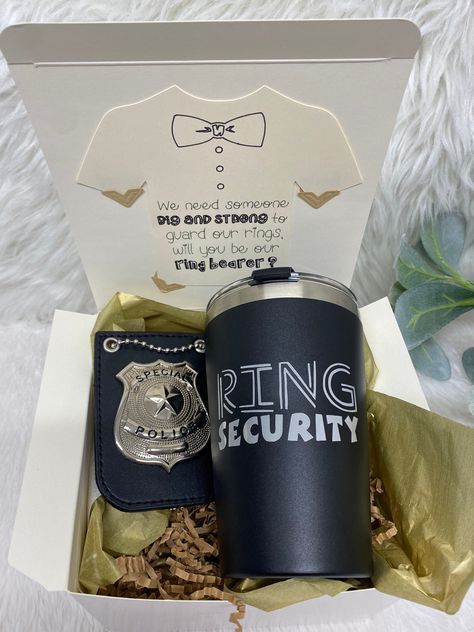 Ring Bearer Proposal Box Ideas, Grooms Proposal Ideas, Ways To Ask Ring Bearer To Be In Wedding, Ring Security Ring Bearer Proposal, Ring Bearer Ideas Asking, Wedding Party Asking Ideas, Groomsmen Proposal Ideas, Ring Bearer Proposal Ideas, Police Officer Wedding Ideas