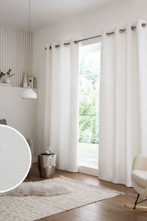 Textured curtains. Heavyweight fabric. Silver brushed eyelets. These stylish textured curtains are the perfect way to dress your windows. The heavyweight fabric drapes beautifully for a sophisticated look, while simple silver brushed eyelets make them easy to pair with your existing or chosen curtain pole. The standard lightweight lining adds an extra layer to the back of curtains to provide added durability and to help prevent fading over time. Or, opt for our Blackout Thermal lining, which has White Eyelet Curtains, White Curtains Bedroom, Textured Curtains, Chenille Curtains, Curtains White, Curtain Pole, Voile Curtains, Increase Energy, Curtain Texture