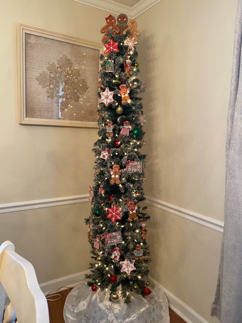 Pencil christmas tree gingerbread theme in dining room. Decorating A Pencil Christmas Tree, Pencil Tree Decorating Ideas, Pencil Trees Decorating Ideas, Christmas Tree Gingerbread, Pencil Tree, Gingerbread Theme, Pencil Trees, Christmas Tree Decorating Themes, Christmas Dining Room