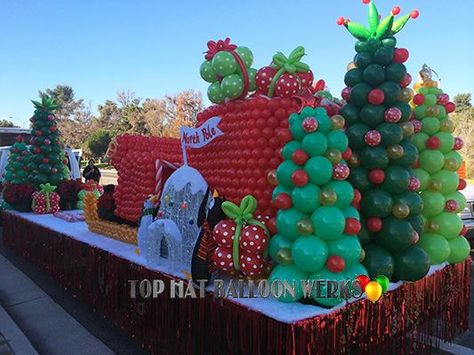 Elf Christmas Float Ideas, Balloon Christmas Parade Float, Radio Flyer Christmas Float, Rocking Around The Christmas Tree Float, Christmas Parade Floats Diy, Grinch Christmas Parade Float, Grinch Christmas Float, Christmas Float Ideas Parade, Grinch Float Parade Ideas