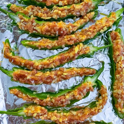 Make these super easy and delicious stuffed Italian long hot peppers for your next get together, or as a quick meal along with a big salad! Crunchy on outside, bursting with flavor on inside!