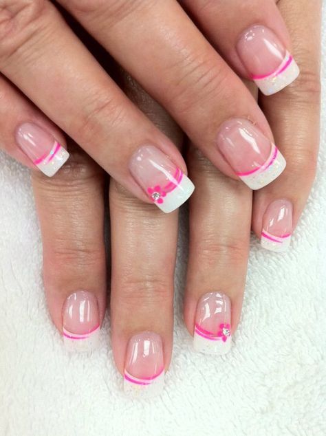 Pretty in pink Spring French Tip Nails Pink, Fun Pink French Tip Nails, June French Tip Nails, Nail Ideas Summer French Tip, Pink French Tip With Accent Nail, French Tips With Pink Flowers, Spring French Manicure, Spring French Tip Nails, Summer French Manicure