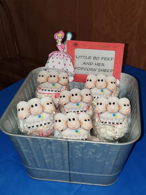 Popcorn balls, cardstock cutouts Toy Story Popcorn, Bo Peep Birthday Party, Bo Peep Party, Toy Story Sheep Popcorn, Toy Story Birthday Party Ideas Food, Andys Toys Party Favor, Toy Story Food, Bo Peep Toy Story, Unicorn Birthday Party Decorations