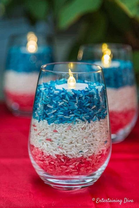 These DIY red, white and blue candle holders are really easy and cheap DIY projects to make! They are perfect for your patriotic Memorial Day or 4th of July decorations.  #entertainingdiva #PatrioticDecor #diyprojects #4thofjuly #memorialday #memorialday4thofjulyentertainingideas Red White Blue Wedding, Patriotic Candles, July 4th Wedding, Ostrich Feather Centerpieces, Blue Candle Holders, White Table Settings, House To Home, Blue Candle, Red Tablecloth