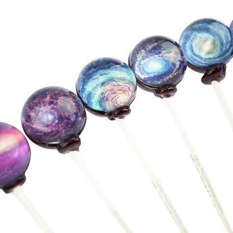 Galaxy lollipops universe designs lollipops are handcrafted by Sparko Sweets. Our Galaxy Planet Lollipops are our solar system lollipops. Our Galaxy Lollipop collection has grown to Universe, Cosmo, Nebula, NASA, Supernova, Planet Art, and other space themes! Perfect for gifts and galaxy themed birthday parties. Spiral Lollipop, Galaxy Lollipops, Custom Lollipops, Space Party Favors, Space Candy, Candy Companies, Sweets Gift, Spiral Galaxy, Space Gift