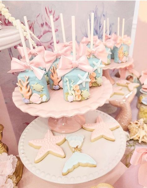 A Dream Under the Sea for Millie Saige | CatchMyParty.com Under The Sea Sweet Table, Pink Under The Sea Party, Under The Sea Girl Baby Shower Theme, Under The Sea Desserts, Under The Sea Gender Reveal, Under The Sea Birthday Party Decorations, Under The Sea Dessert Table, Underwater Theme Party, Mermaids Birthday Party