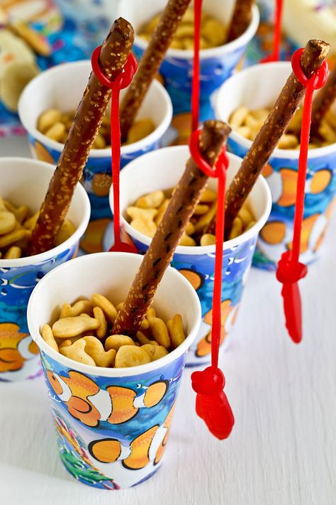 Fish Theme Party Decorations, Fishers Of Men Snack Ideas, Fish Fruit Tray Party Ideas, Fisherman Themed Birthday Party, Food Ideas For Fishing Theme Party, Pretzel Fishing Rods, Fish Theme Party Games, Fishing Party Snack Ideas, Fishing Birthday Party Food Ideas