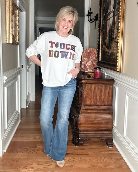 Touch Down game day sequin sweatshirtThe Best Football-themed Shirts For Women Over 50 tania stephens fashion blogger 50 is not old Game Day Outfits For Women, Tania Stephens, College Football Outfits, 50 Is Not Old, Themed Shirts, Football Graphic Tee, Football Earrings, Touch Down, Sequined Sweatshirt