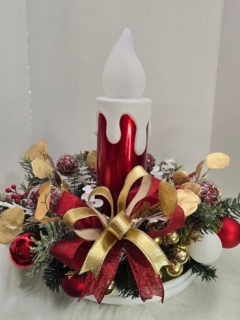 This gold and red flameless candlestick Christmas centerpiece will be the perfect centerpiece for your table, mantle,  or any counter space.  Nothing say Christmas better than the colors gold and red. >>Battery Operated (3 D batteries)...NOT INCLUDED >>Candlestick is removeable for easier storages and battery component is on the bottom of candlestick base. >>Flame flickers >>Ready to ship >>Handmade and one of a kind Candlestick Christmas, Gold Centerpiece, Xmas Centerpieces, Christmas Candlesticks, Candlestick Centerpiece, Candle Decoration, Christmas Centers, Centerpiece Christmas, Gold Centerpieces