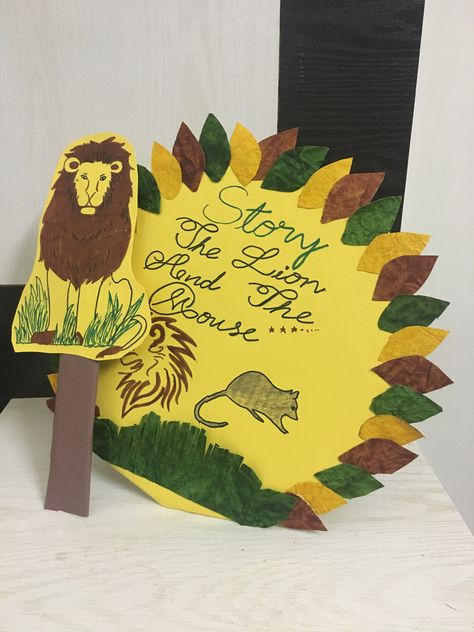 Kindergarten lion & the mouse story puppets using KG cardboard sheet and handmade sheets ,present with beautiful leafy decoration and colourful drawing🎨✏️ Story Puppets, Lion And Mouse, Colourful Drawing, Lion And The Mouse, Handmade Sheet, Story Props, Mouse Drawing, Kindergarten Math Activities, 2d Shapes