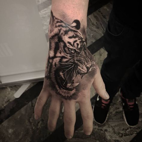 Realistic tiger hand tattoo Tiger Hand Tattoo Men, Ash Tattoo, Tiger Hand Tattoo, Tatted Men, Finger Tats, Hand And Finger Tattoos, Tattoo Reference, Hand Tats, Tattoo Hand