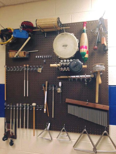 Percussion wall Auxiliary Percussion Storage, Band Room Ideas, Band Classroom, Music Room Organization, Music Room Office, Band Rooms, Music Classroom Organization, Choir Room, Band Room