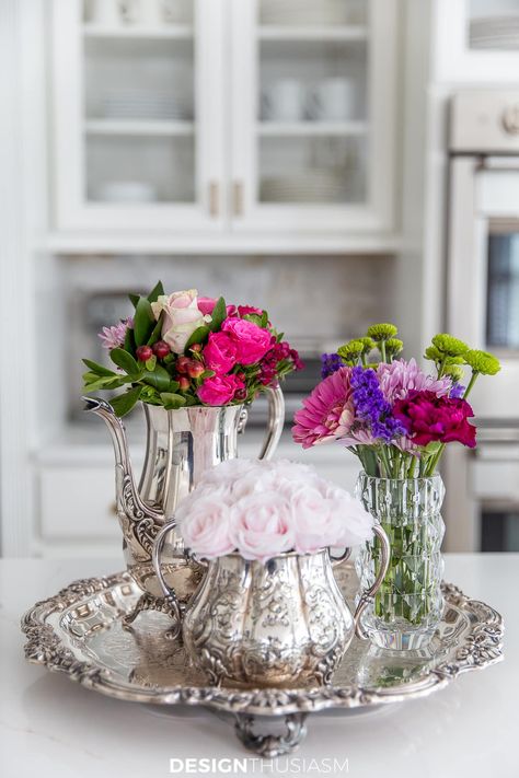 white kitchen Silver Pitcher Decor Ideas, Tea Pot Floral Centerpiece, Flowers In White Pitcher, Silver Plate Decor, Faux Flowers In White Pitcher, Silver Pitcher With Flowers, White Kitchen Makeover, Faux Wood Tiles, Country Interior Design