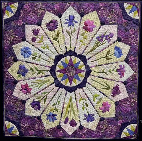 How often did she change thread? https://bit.ly/47njtAk Dresden Flowers by Jackie Hillman was featured in the Appliqué category, sponsored by The Quilt Show itself, at the 2023 Houston Quilt Festival. Jackie's design was inspired by both the Mariner's Compass and Dresden plates. As she puts it, "Being inspired by the trend of making circular quilts and loving flowers, I decided to make a giant Dresden. After completing the blades, I had no idea how to complete the center. I took a class from Robin Long and made the Mariner's Compass blocks using the same color scheme." Dresden Plate Patterns, Necktie Quilt, Dresden Plate Quilts, Dresden Quilt, Photo Quilts, Fusible Applique, International Quilt Festival, Mariners Compass, The Quilt Show