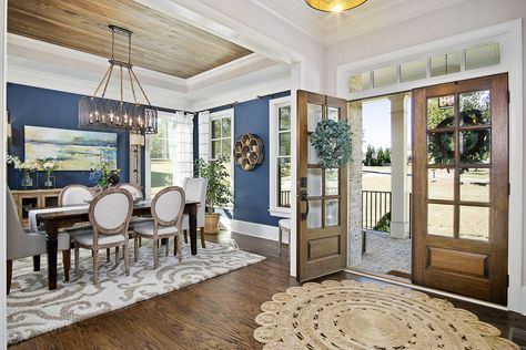 entry and blue painted dining room Foyer With Dining Room Entryway, Blue Entryway Paint Colors, Foyer Into Great Room, Front Door Entry Into Dining Room, Dining Room Off Front Entry, Dining Room By Entryway, Ranch Foyer Ideas Entryway, Front Entry Into Dining Area, Dining Room Front Door