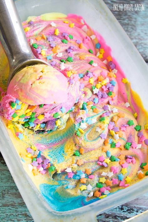 Unicorn Ice Cream is magic on a cone! There's nothing better on a hot day than rainbow ice cream that's covered in star sprinkles and glitter! Bread Booze Bacon, Unicorn Ice Cream, Unicorn Treats, Unicorn Desserts, Pastel Cupcakes, Rainbow Ice Cream, Star Sprinkles, Rainbow Food, Unicorn Foods