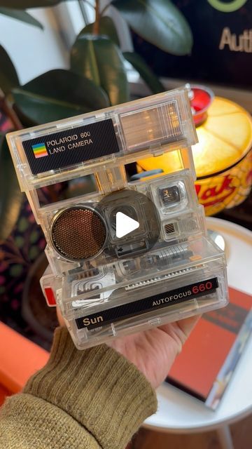 Brooklyn Film Camera on Instagram: "👻 A look at our transparent Polaroid Sun 660! This camera dates back to 1981 and these transparent models are incredibly rare. They were issued primarily to company salesmen so they could easily show all of the modern circuitry and gearing to customers and very few have survived. Like most transparent demo cameras, this Sun 660 *functions* but doesn’t “work”. Why? Well, light passes through the transparent body and destroys any film that’s loaded before it even has a chance to be exposed! Come see this beautiful camera along with many other rare Polaroid cameras and collectibles in our Polaroid Museum; on-view during all open store hours! 🌈✨" Brooklyn Film, Polaroid Cameras, Disposable Camera, Store Hours, Film Camera, Instagram A, Cameras, Brooklyn, Dates