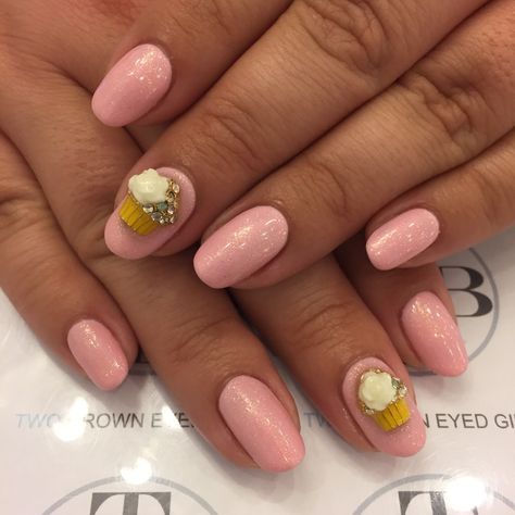 Birthday nail art with light pink base gel. Sparkle coat and cupcake charms. Super girly birthday nails! Pink Nail With Charms, Pink Nails W Charms, Birthday Nails Cupcake, Pink Nails With Gummy Bear Charms, Pink Nails With Bow Charm, Birthday Nail Art, Cupcake Charms, Cupcake Art, Birthday Nails