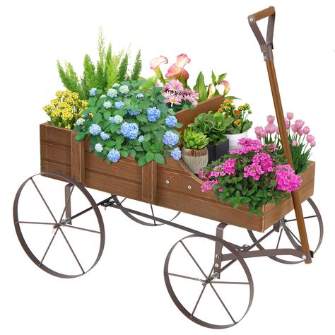 PRICES MAY VARY. Classic Wagon Appearance: This wooden planter is designed to resemble a classic horse-drawn carriage and coated with vibrant finishes, which could add a touch of rustic elegance to your space. Sturdy & Durable Construction: The small decorated cart boasts a natural fir wood planter, ensuring excellent strength and deformation resistance. And it is supported by a solid metal frame that offers robust support and stability. Easy Movement for Great Convenience: This decorative garde Wagon Garden, Plant Bed, Wagon Planter, Wood Wagon, Garden Wagon, Raised Planter Boxes, Wagon Cart, Wooden Wagon, Garden Cart