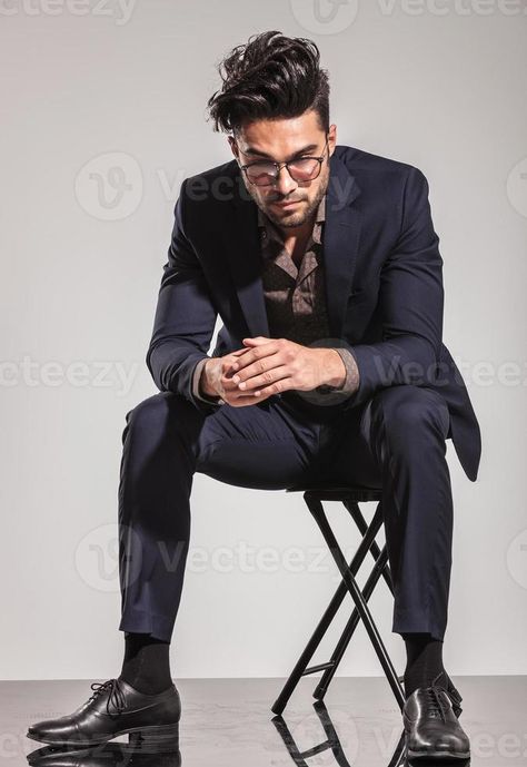 business man sitting on chair and looking down Sitting Pose Reference, Chair Pose, Senior Portrait Poses, Male Pose Reference, Body Sketches, Sitting Poses, Man Sitting, Human Poses Reference, Elegant Man