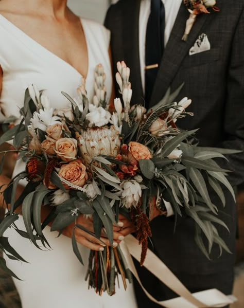 This lush bouquet features greenery + rust and peach-colored blooms | Image by Madeline Shea Photography Bohemian Wedding Bouquet, Flowers And Greenery, Sonoma Wedding, Wedding Week, Fall Wedding Bouquets, Fall Wedding Flowers, Orange Wedding, Wedding Flower Arrangements, Vineyard Wedding