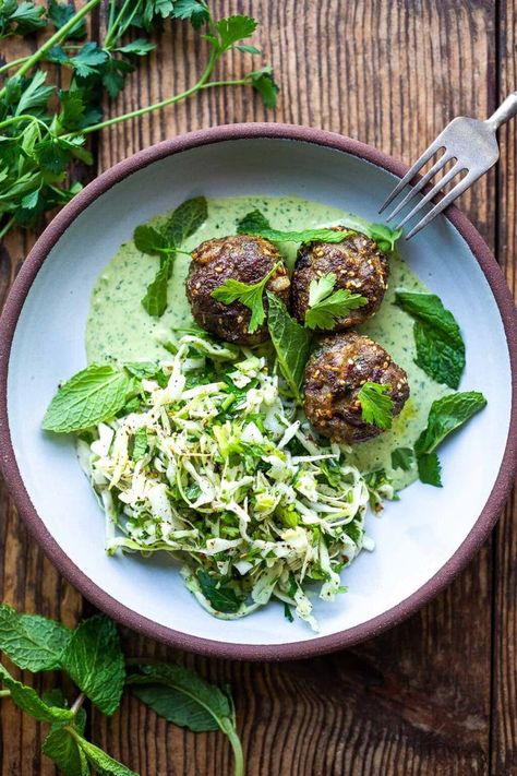 Zaatar Meatballs with Green Tahini Sauce can be made with ground turkey, chicken, lamb or beef. A quick, low-carb meal that is full of flavor. #meatballs #zaatar Green Tahini Sauce, Spring Eats, Zaatar Recipe, Arabisk Mad, Green Tahini, Spring Produce, Plats Healthy, Spring Recipe, Lamb Meatballs