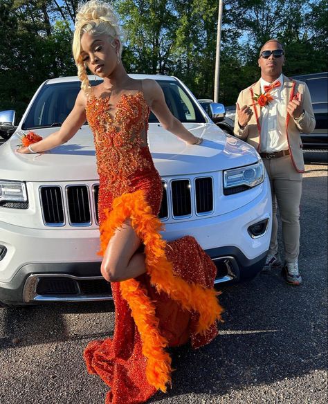 Orange Prom Black Couple, Burnt Orange Prom Dress Black Couple, Orange Prom Dress Black Couple, Orange Prom Ideas, Orange And Gold Outfit, Burnt Orange Prom Dresses, Orange Prom Dresses Black Women, Orange Prom Couple, Prom Couples Black People