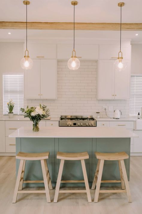 White Shaker Kitchen Green Island, White Cabinets Sage Island, Different Colour Kitchen Island, Soft Green Kitchen Island, Sage Kitchen Island White Cabinets, White Shaker Kitchen With Island, White Kitchen With Sage Green Island, Sage Green Kitchen Island White Cabinets, Light Green And White Kitchen