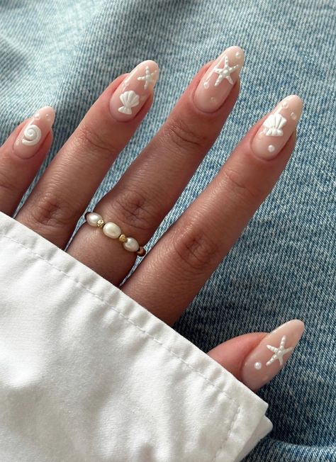 Your daily dose of the most viral beach nails from the biggest nail gurus! Find #summer 2024 nail inspo for the cutest summer nails, featuring ocean nails, vacation nails, beach nails, and tropical nails! #nails inspo #summernails Nails Starfish Design, West Coast Nails, White Starfish Nails, Beach Nails Starfish, East Coast Nails, Starfish Nails Design, White Detail Nails, Star Fish Nail Art, Zoifishh Nails