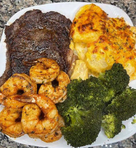 A mouthwatering dinner spread featuring juicy steak, succulent shrimp, creamy cheesy scalloped potatoes, and vibrant broccoli. Soul Food Menu, Cheesy Scalloped Potatoes Recipe, Potatoes And Broccoli, Steak Shrimp, Scalloped Potatoes Recipe, Cheesy Scalloped Potatoes, Easy To Cook Meals, Steak And Shrimp, Scalloped Potatoes Cheesy