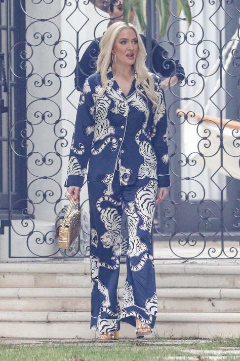 ERIKA Jayne was seen for the first time in Bel Air since she had been accused of “lying and contradicting herself” on The Real Housewives Of Beverly Hills reunion.  Erika, 50, was spotted out and about on a stroll in the Bel Air area. The Real Housewives star wore a blue outfit, which had drawings of tigers […] Erika Jayne Outfits, Drawings Of Tigers, Erika Jayne, Tiger Drawing, Real Housewives Of Beverly Hills, Housewives Of Beverly Hills, Print Pajamas, Blue Outfit, Real Housewives