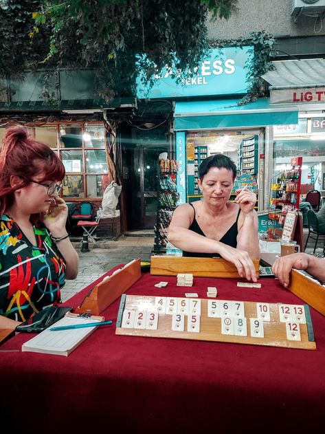 Kadıköy - Would you like to visit a traditional, authentic "Kahvehane" where old people play board games eachother for hours and drink turkish tea? Would you like to join them? -Visit a very local part of the city, Kadıköy and be a local Istanbuler for a few hours. -Learn to play traditional Kahvehane games (Turkish rumicub/mahjong and backgamon) -Watch how professional old people play it eachother. -Drink turkish black tea, kiwi tea or Turkish coffee as other locals. -Visit 3 different " Turkish Tea, Traditional Games, Turkish Coffee, Old People, Black Tea, Kiwi, Cosmos, Board Games, To Play