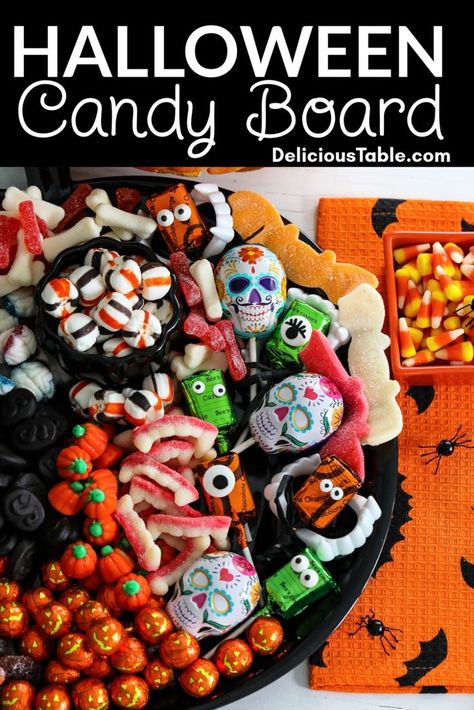 A Halloween candy board filled with cute and scary candy like teeth, pumpkins, brains, worms and more for a Halloween party. Funfetti Cheesecake Bars, Halloween Candy Board, Caramel Apple Lollipops, Halloween Charcuterie Board Ideas, Spooky Desserts, Spider Web Cookies, Halloween Charcuterie Board, Halloween Rice Krispie Treats, Spooky Halloween Desserts