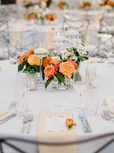 Orange Centerpiece Ideas, Orange Flower Centerpieces Wedding, Orange Floral Centerpieces, White Gold Orange Wedding Table Settings, Orange Roses Centerpiece, Orange Flowers Table Decor, Orange And White Floral Centerpiece, Center Piece Wedding Deep Orange With Flowers, Orange Wedding Centerpieces