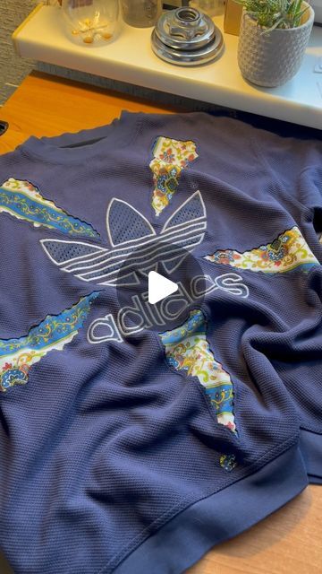 sewitagain on Instagram: "sew upcycle rework repeat ♻️ Old #adidas sweatshirt combined with vintage curtain Method: Reverse Appliqué ✨ 💙Blue collection sweatshirt No. 3 • #reworked #reworkedclothing #reworkedfashion #sustainablefashion #upcycledclothing #upcycledfashion" Sweatshirt Refashion Diy Upcycle, Reverse Applique Sweatshirt, Upcycling Sweatshirt, Applique Sweatshirts, Reworked Tshirt, Embroidered Sweatshirt Diy, Sew Upcycle, Old Adidas, Diy Sweatshirt Refashion