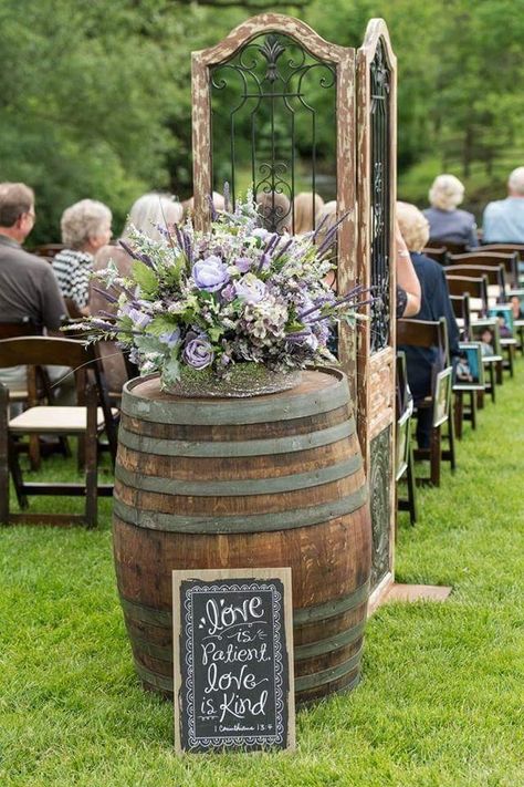 Rustic alter arrangement , great for podiums or whiskey barrel toppers. This arrangement is made of lavender, cream and greenery stems in a garden gathered arrangement, finished off with sequenced wrapped base Wedding Whiskey Barrel Decor, Whiskey Barrel Wedding Decor, Rustic Alter, Lake Theme Wedding, Whiskey Barrel Flowers, Whiskey Barrel Decor, Barrel Wedding Decor, Barrel Flowers, Alter Flowers