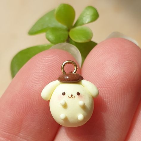 #clay #handmade #ceramics #pottery #art #clayart #sculpture #ceramic #polymerclay #ceramicart #artis Pompompurin Polymer Clay, Clay Charms Sanrio, Clay Pompompurin, Sanrio Clay Charms, Polymer Clay Sanrio, Clay Charms Aesthetic, Clay Keychain Ideas, Sanrio Clay, Cute Polymer Clay Earrings