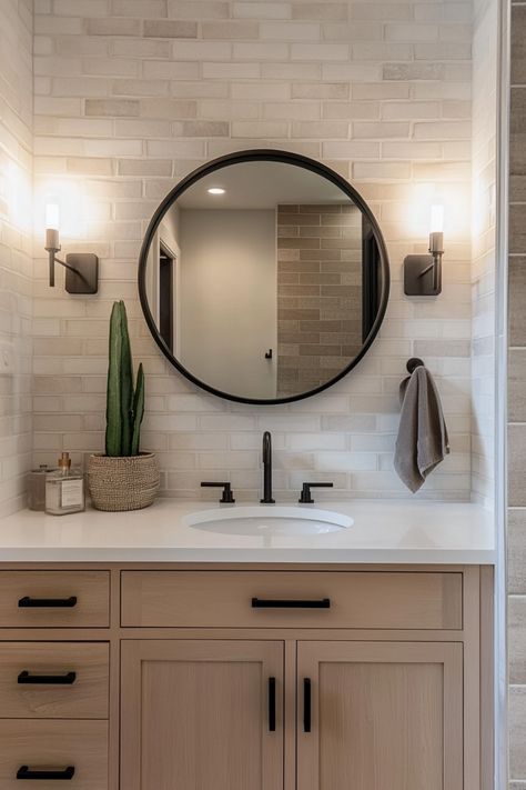 Get inspired by this modern guest bathroom that beautifully blends rustic and farmhouse vibes. Perfect for a tiny powder room or downstairs bathroom, this space shows how small rooms can make a big impact. With sleek black fixtures and wood accents, the furniture adds to the charm of this bathroom cottage design. Whether you're planning a remodel or redesign, this calming washroom offers the perfect balance of style and functionality for any house. Bathroom Decor With Shiplap, Clean Bathroom Inspiration, Guest Bathroom Black Fixtures, Guest Bathroom Before And After, Dark Walled Bathroom, Black Accent In Bathroom, Small Bathroom Ideas With Black Accents, Guest Bathroom Ideas Brown Cabinets, Bathroom Design Modern Farmhouse