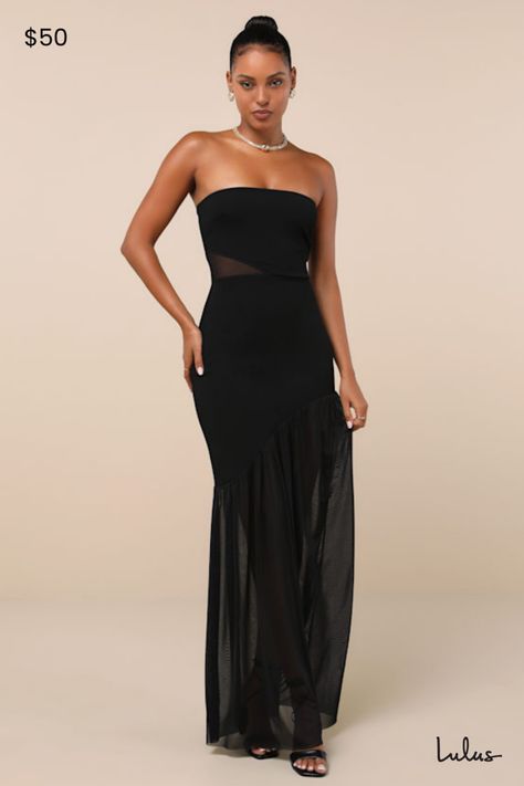 The chic essence of the Lulus Exemplary Sensation Black Strapless Asymmetrical Maxi Dress will command everyone's attention when you strut into the room! Stretchy crepe knit shapes this stunning dress that features a straight neckline and a darted, strapless bodice (with hidden no-slip strips) and a flirty mesh side cutout that lends a stunning effect. High, fitted waist sits atop tops a bodycon skirt that continues down to an asymmetrical seam and ends at a sheer mesh maxi hem. Fit: This garment fits true to size. Length: Floor length. Bust: Great for any cup size. Waist: Fitted - stretchy fabric allows custom fit. Hip: Fitted - stretchy fabric allows room for hips. Undergarments: May be worn with a strapless bra, adhesive bra, petals, or no bra. Fabric: Fabric has some stretch. Bodice is Classy Black Dresses, Black Tie Wedding Guest Dress Fall, Black Tie Attire For Women, Unique Black Dress, Black Wedding Guest Dress, Unique Black Dresses, Black Wedding Guest Dresses, Black Tie Wedding Guest Dress, Casual Wedding Attire