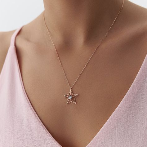 Dazzling 14k Rose Gold Star Necklace - Elevate Your Style with this Pave Elongated Star Pendant Elegance meets celestial charm in our 14k Rose Gold Star Necklace, a radiant piece that adds a touch of celestial magic to your everyday style. This exquisite necklace features a delicate, elongated star pendant paved with shimmering, high-quality diamonds, creating a dazzling trail of stardust wherever you go. Gold Star Necklace, Celestial Magic, Star Necklace Gold, Necklace Star, Gold Star, Star Pendant, Star Necklace, Gold Stars, Quality Diamonds