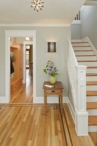 Lovely entry with light grey walls, white trim, medium hardwood Hardwood Floor Colors, Living Room Wood Floor, Серая Кухня, Grey Wood Floors, Oak Wood Floors, Light Grey Walls, Light Wood Floors, Room Paint Colors, Floor Colors