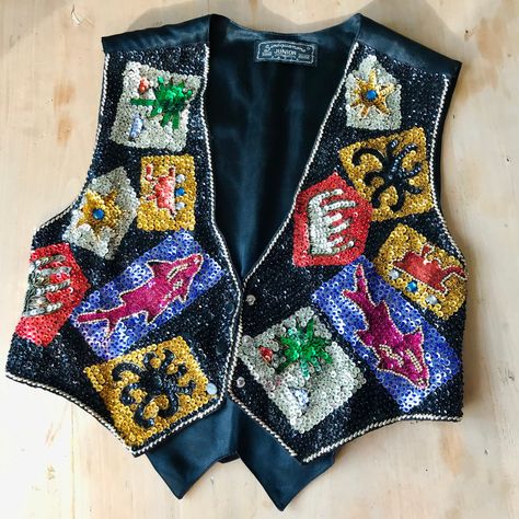 80s 90s sequin womens vest waistcoat.  A masterpiece in design and execution.    Closes with 3 snaps in front. A tie in the waist back.  In good condition, minor signs of wear.  FITS A SIZE S/M.  MEASUREMENTS approx.: Length 40 cm - 16 inches.  Armpit to armpit 48 cm - 19 inches.  Bottom from side to side 46 cm - 18 inches. Can be made smaller with the tie in the back.  Item is shipped from Holland WITH a track and trace number. Please ask any questions prior to purchasing. Thank you. Waistcoat Design, Waistcoat Designs, Old Cds, Paris Vintage, Vest Waistcoat, Cropped Vest, Vest Outfits, Womens Vest, Different Styles