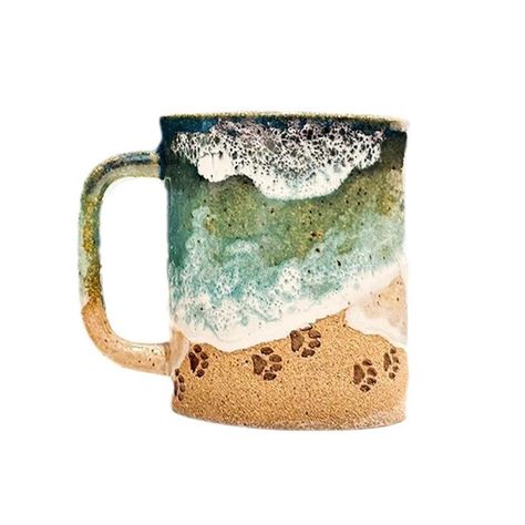 PRICES MAY VARY. Bring the beauty of the ocean to your home with our Claw Print Ocean Mug. Experience the sensation of claw marks on gritty sands and the effect of sea foam, awakening your senses. Enjoy the pleasure of sliding your along the side of the mug while sipping your favorite beverage. Handcrafted and hand-painted, this mug will transport you to rolling waves and your favorite beach. Each of our mugs is a functional work of art, meticulously crafted and requiring numerous steps and ampl Clay Book, Ocean Mug, Claw Marks, Paw Pattern, Ceramic Inspiration, Foot Print, Mug Ceramic, Ceramic Coffee Cups, Pottery Ideas