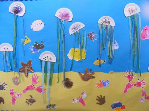 under the sea handprint crafts | Under the Sea" collage which was displayed in the School. Fish Bulletin Boards, Sea Life Theme, Under The Sea Crafts, Dramatic Play Area, Preschool Bulletin Boards, Bulletin Board Ideas, Sea Crafts, Under The Sea Theme, Rainbow Fish