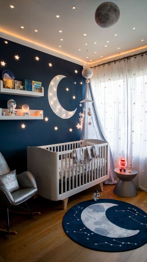 Space-themed nursery with moon and star lights, celestial decor, and a cozy crib setup. Boy Nursery Inspiration, Baby Boy Nursery Stars, Baby Boy Nursery Ideas, Celestial Nursery, Dark Nursery, Nursery Inspiration Boy, Boy Nursery Ideas, Star Themed Nursery, Glowing Star