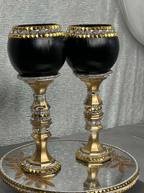 2 candle holders sits on a decorative stand. The color stands out and adds a rich tone to any area of your room. 49ers Room, Glitter Wine Glasses Diy, Iron Headboard, Glitter Vases, Toilet Paper Roll Art, Masters Graduation, Crafts With Glass Jars, Table Centerpieces Diy, Glitter Wine Glasses