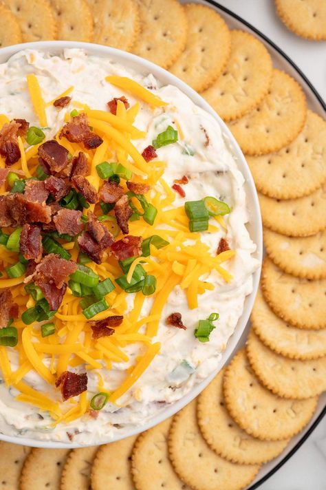 crack dip served on a plate with crackers. Cracked Corn Dip Recipe, Cold Dip Recipes For Crackers, Crackers And Dip Appetizers, Dips That Go Good With Crackers, Cold Cracker Dip Recipe, Cold Dips For Crackers, Ritz Cracker Dips, Appetizers With Crackers, Chip Bar Party