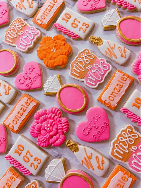 Pink And Orange Desserts, Bachelorette Dessert Table, Hot Pink Bridal Shower Cookies, Pink And Orange Bachelorette Party Theme, Pink And Orange Engagement Party, Pink And Orange Bridal Shower Cookies, Colorful Bridal Shower Theme, Bridal Shower Orange And Pink, Hot Pink And Orange Bridal Shower Ideas