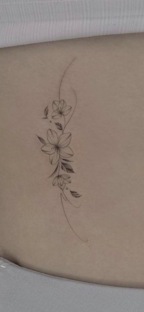 Tulip Wrist Tattoos For Women, Small Vine Of Flowers Tattoo, Small Flower Tattoo Inner Arm, Plumeria Tattoo Wrist, Lotus Flower And Vines Tattoo, Plumeria Back Tattoo, Jasmine Flower Back Tattoo, Simple Flower Wrist Tattoo, Clavicle Tattoos For Women Flowers