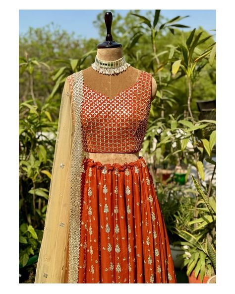 Shiny sequins are embroidered in a linear pattern on this beautiful rust lehenga. Statement embroidered blouse is a sure head turner. It’s perfect glamorous outfit for the festive/wedding season. To place your order DM or WhatsApp us at 9971767771. It can be customised in any colour of your choice. [mirror embroidered lehenga, rust lehenga, bridesmaid outfit, Indian wedding dress, bride to be] #labelsnigdhakapoor #lehenga #indianwedding #rustlehengacholi #mirrorlengha #mehendioutfit #sang... Rust Lehenga, Outfit Indian Wedding, Lehenga Bridesmaid, Outfit Indian, Mehendi Outfit, Wedding Dress Bride, Glamorous Outfits, Festive Wedding, Dress Bride